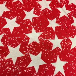 Distressed White Stars on Red Cotton/Poly Jersey Fabric